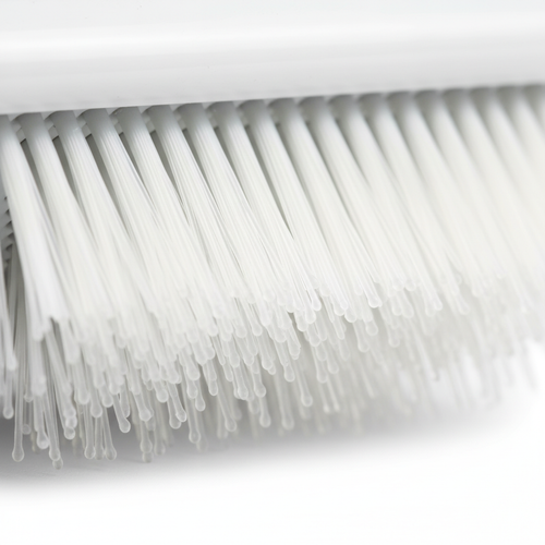 Close-up of soft flexible bristles on pet grooming brush